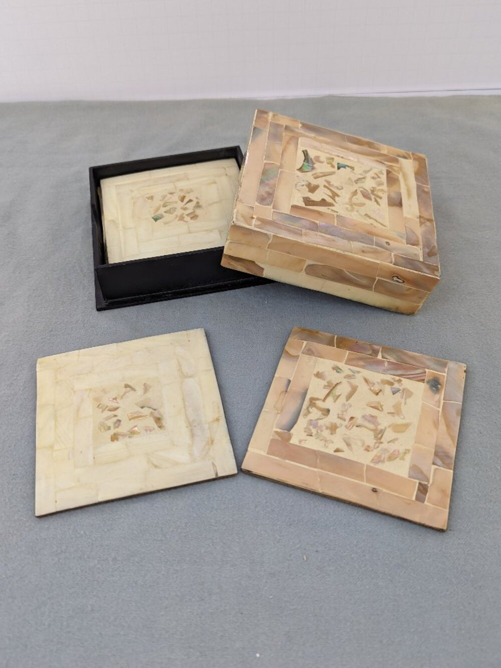 Set of 7 mosaic mother of pearl coasters with storage case